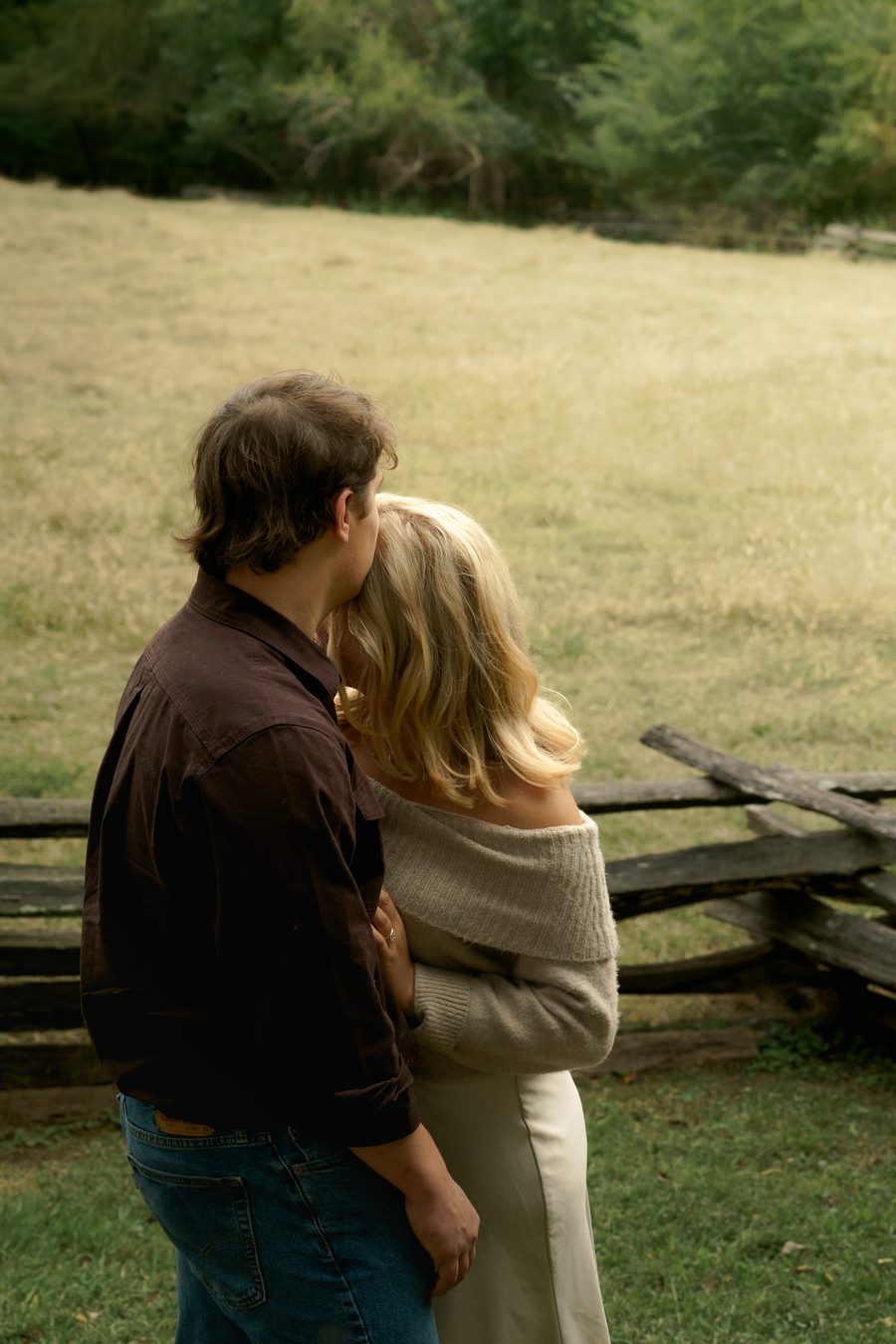 A forehead touch on a grassy hillside