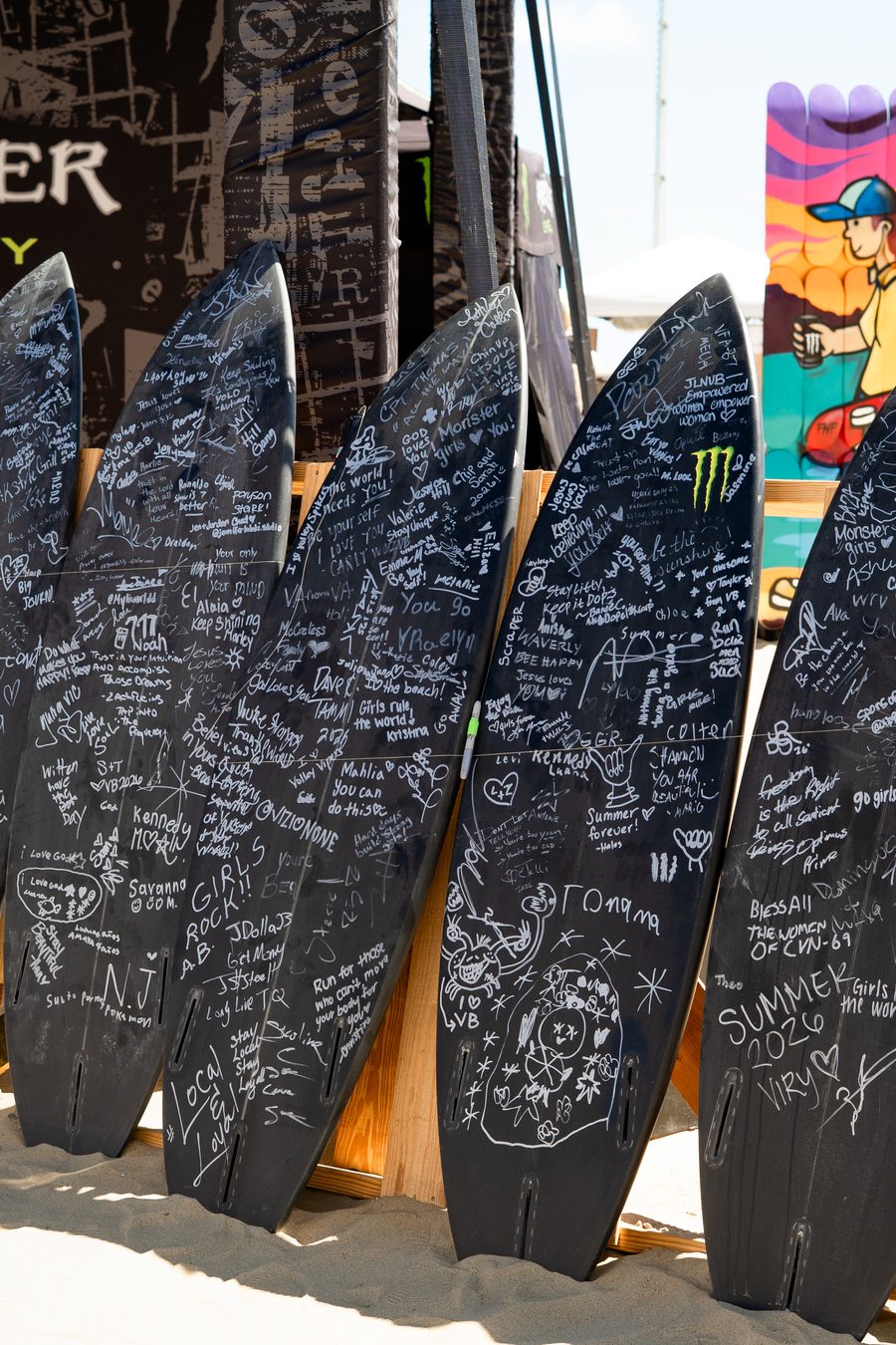 Signed boards lined up along a wall