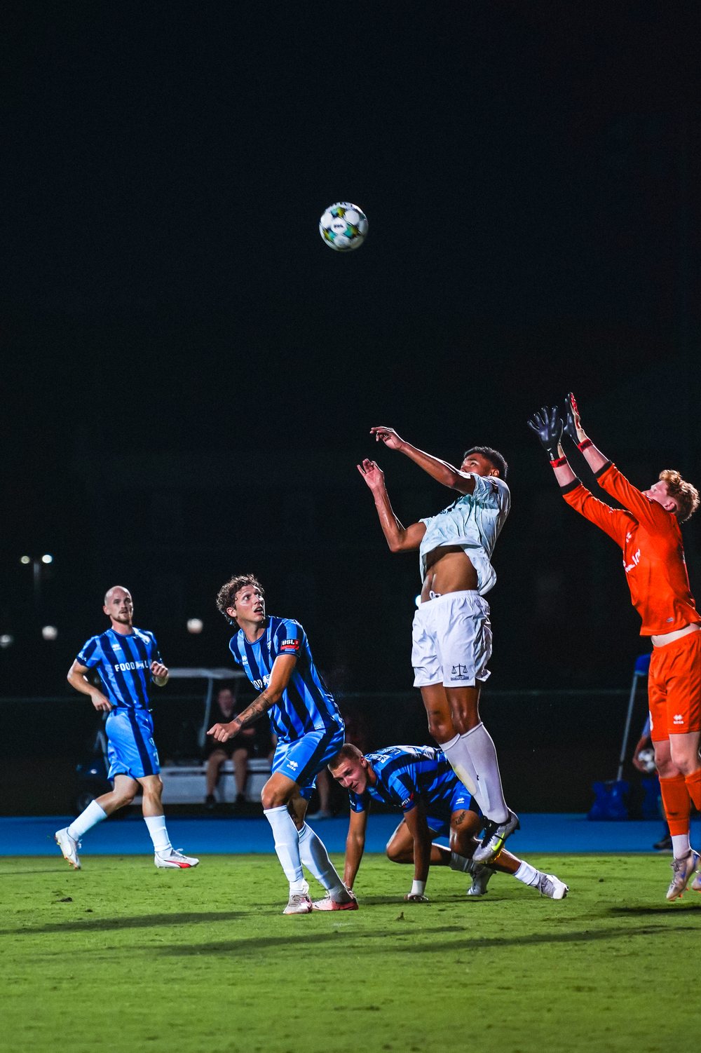 A header challenge under floodlights